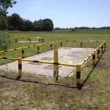 Doorrijbeveiliging rond 114 in 159 mm op betonvloer